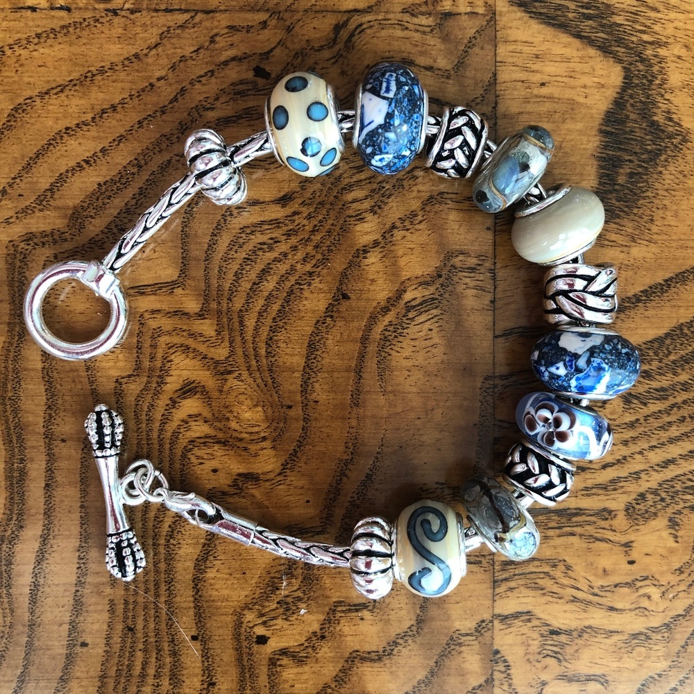 DaVinci blue/tan glass bead and charm silver-tone toggle closure bracelet.